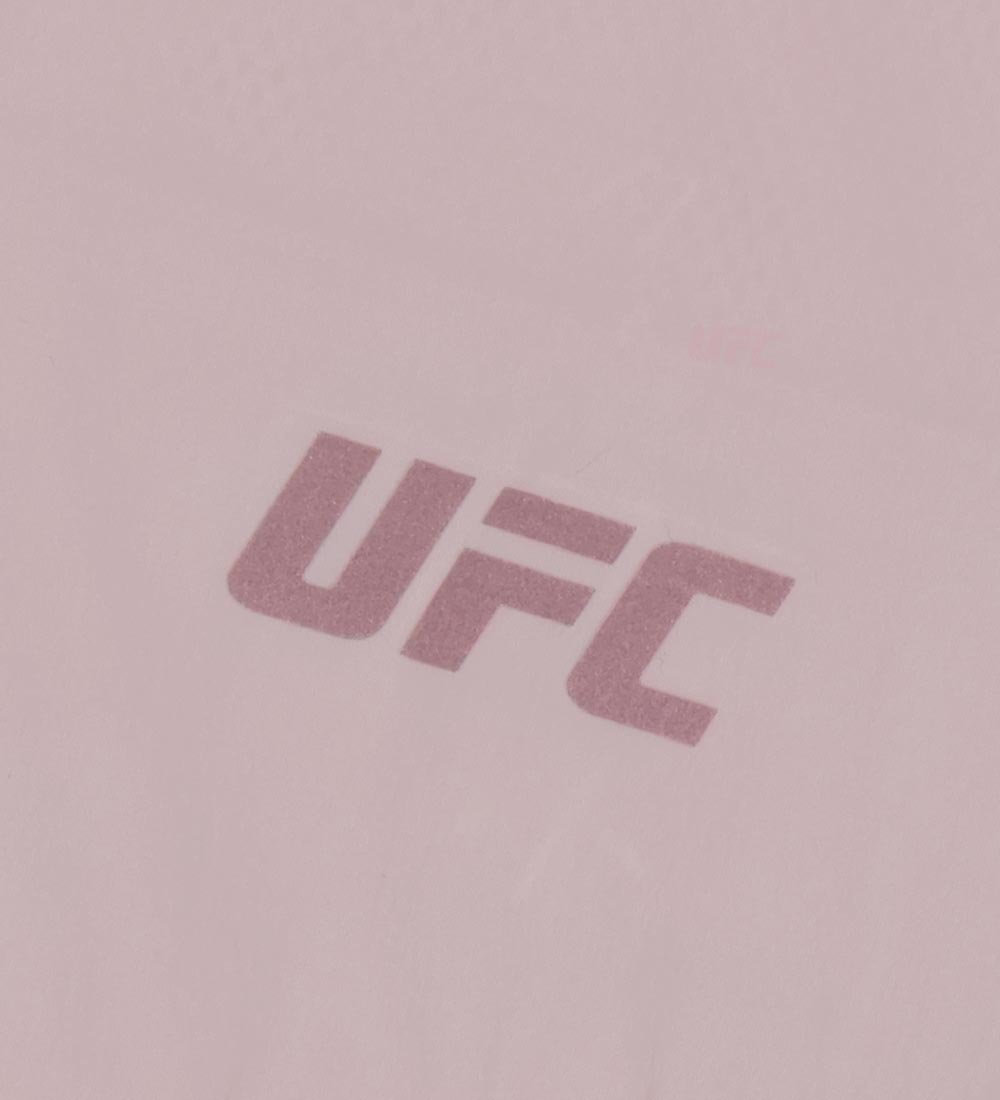 جاكيت خفيف بقصة عادية من UFC Feather، بلون وردي شامباني