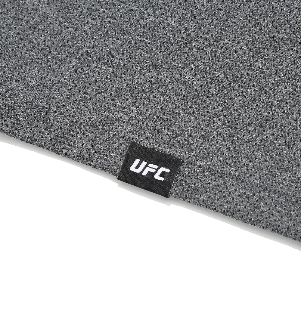 تيشيرت UFC Essentials شبكي بقصّة عادية وأكمام قصيرة، أسود