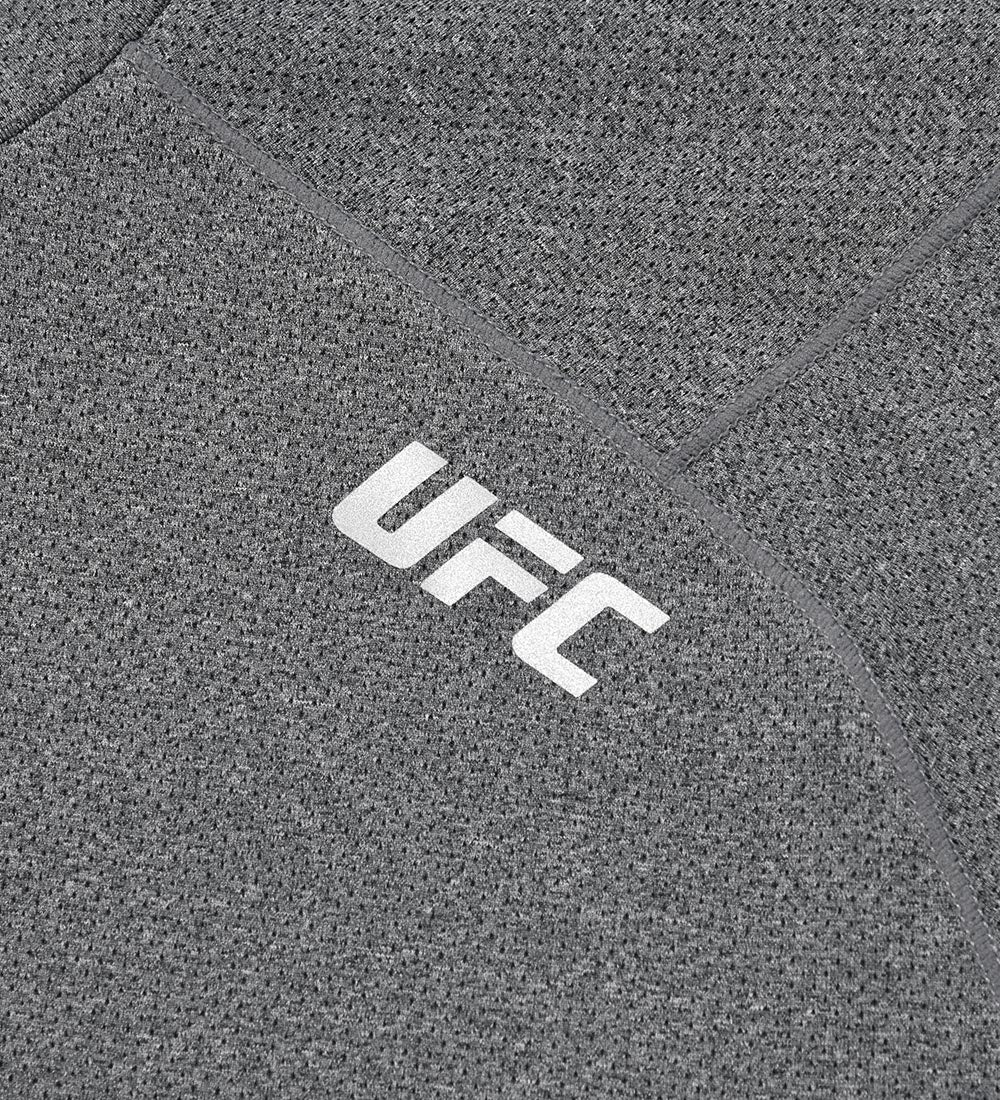 تيشيرت UFC Essentials شبكي بقصّة عادية وأكمام قصيرة، أسود
