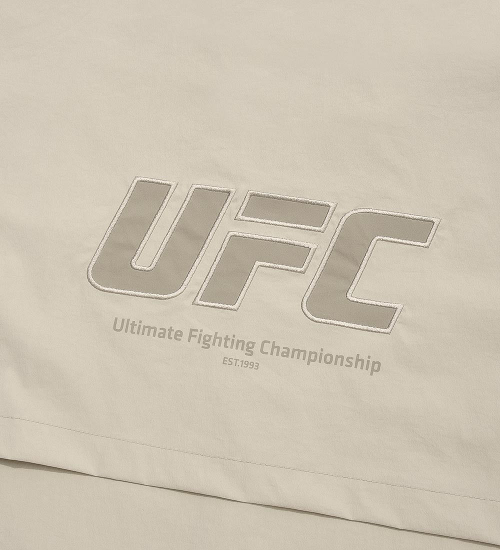 جاكيت UFC تشالنجر بقصّة مريحة - تان